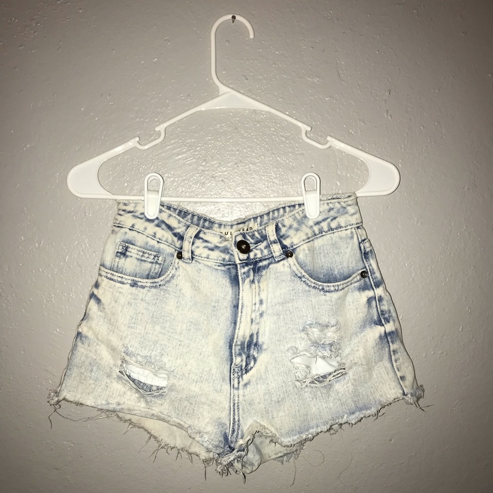 Distressed light blue shorts